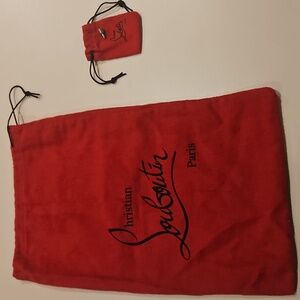 Two Christian Louboutin Red Bags and one beige heel peg replacement.